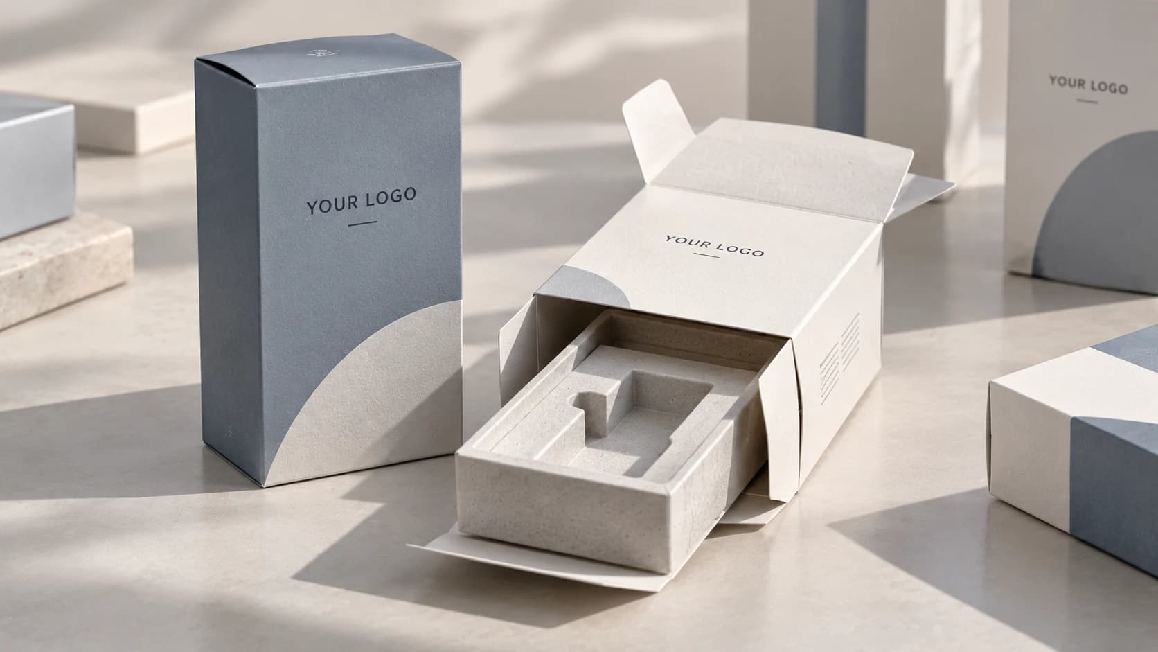 Blue-gray and cream retail cartons with a molded pulp insert