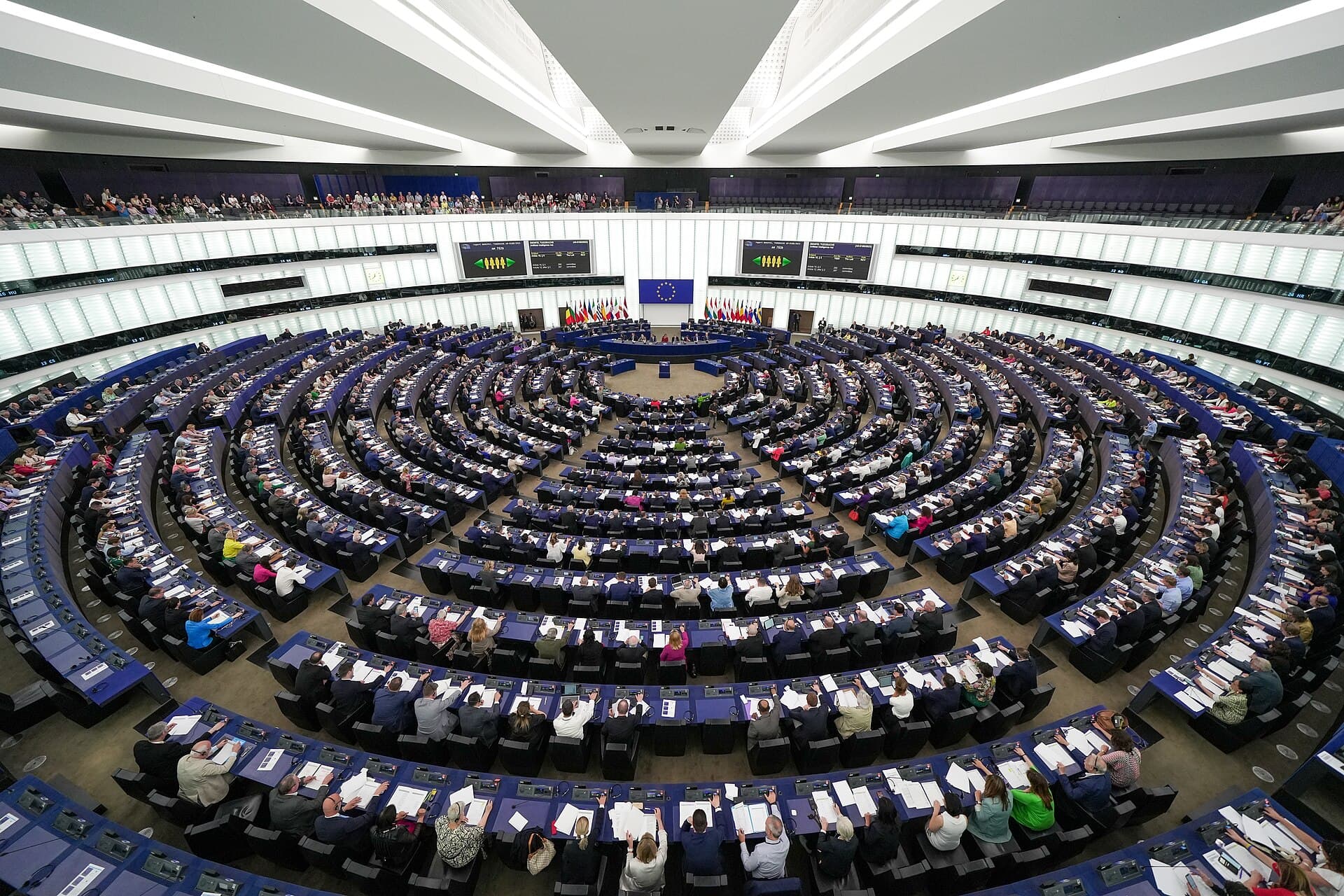Members seated in the European Parliament hemicycle during a plenary session